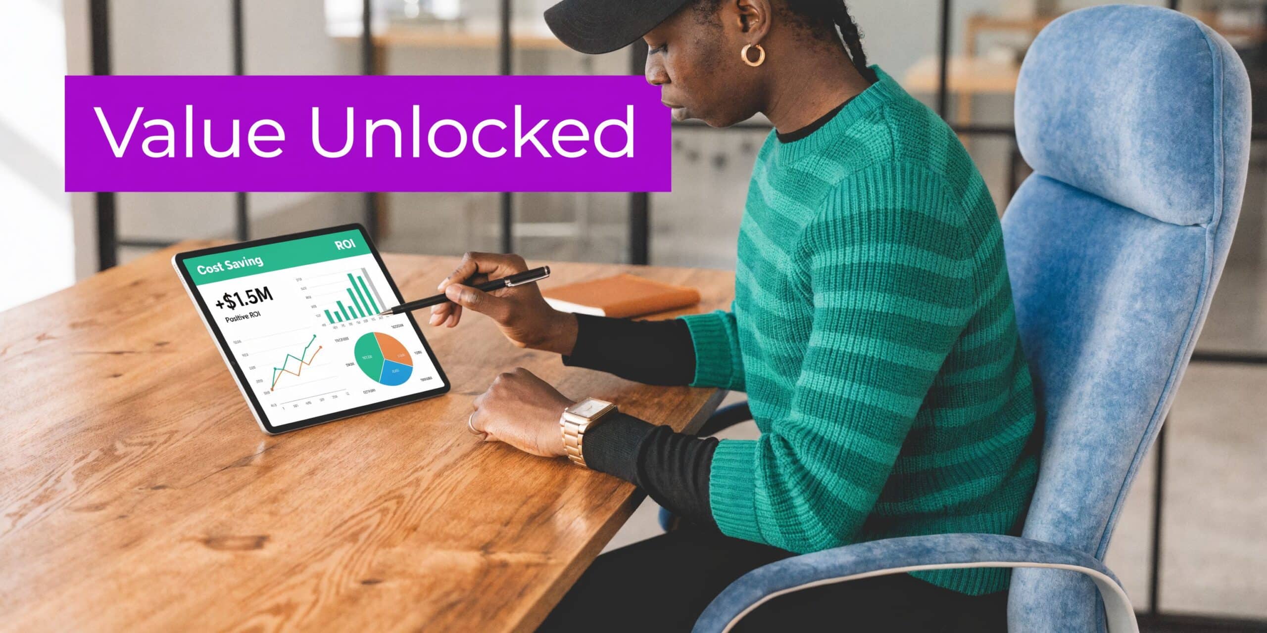 A professional analyzing ROI and cost saving metrics on a tablet while sitting at a desk.